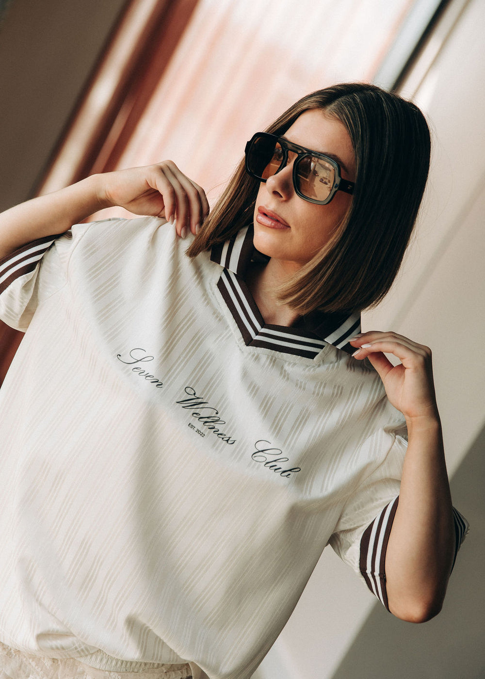 Model in the Heritage Stripe Jersey with contrast V-neck collar and vertical jacquard stripe